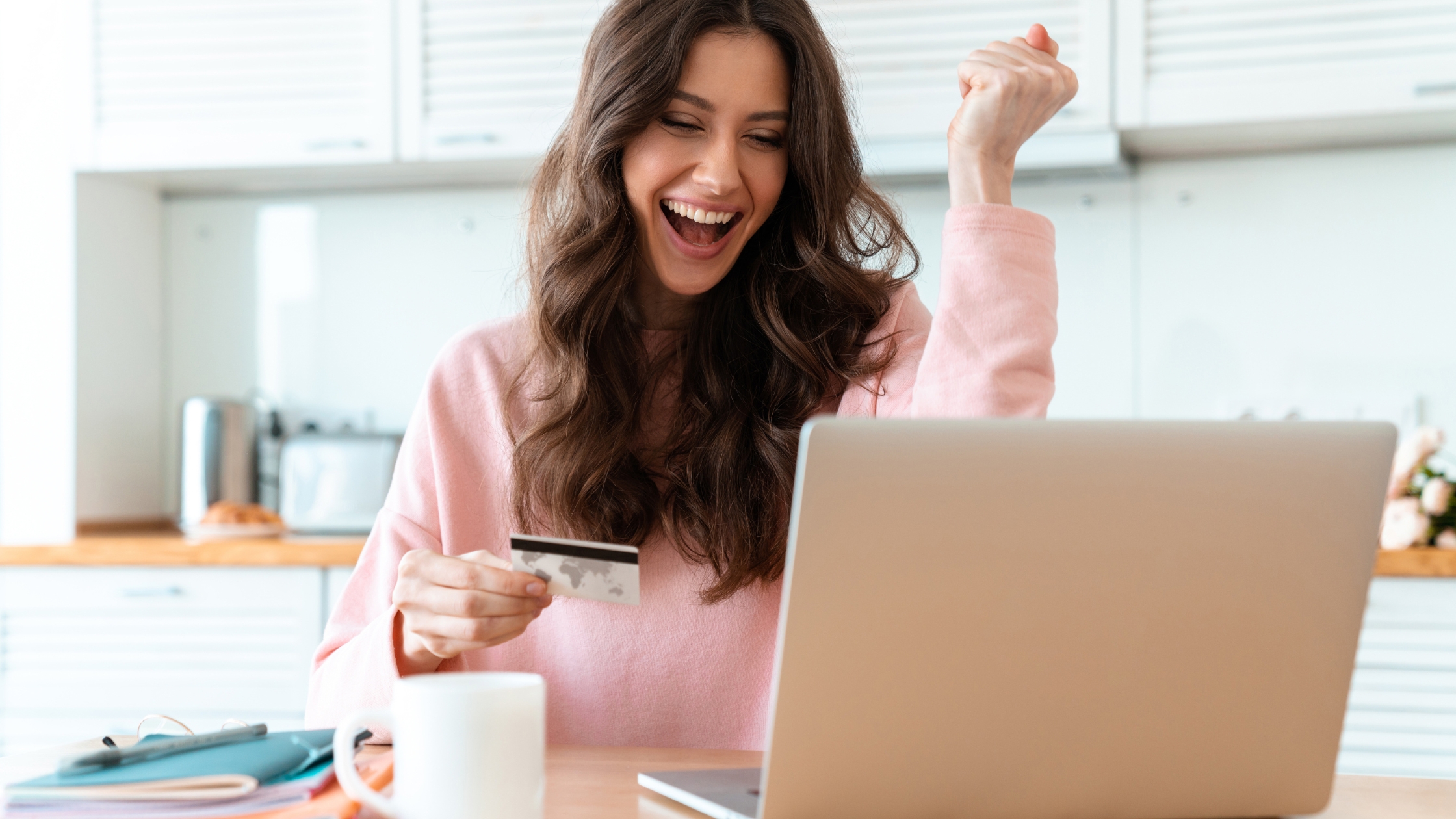 A happy women with credit card